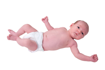 Portrait of a baby boy aged 1 month lying with his eyes open, isolated on a white background. Caucasian child in the children bedroom on the bed