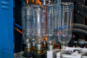 The drinking water bottle manufacturing process by blow mold machine.