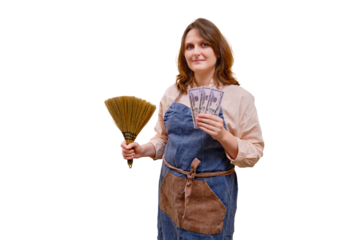 A woman smiles and holds money in US dollars while cleaning a home living room, isolated on a white background