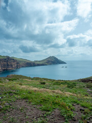 Fototapeta premium Ponta de Sao Lourenco peninsula in east coast of Madeira, Portugal during sunny winter day in Atlantic ocean with Casa do Sardinha, Miraduro Ponta do Furado and tourist footpath in the back, Europe
