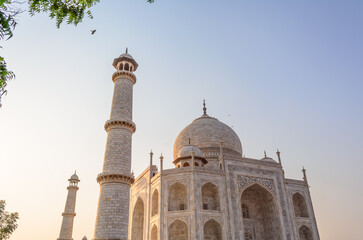 Fototapeta na wymiar The Taj Mahal is an ivory-white marble mausoleum on the south bank of the Yamuna river in the Indian city of Agra, Uttar Pradesh.