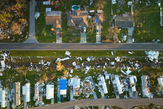 Badly damaged mobile homes after hurricane Ian in Florida residential area. Consequences of natural disaster