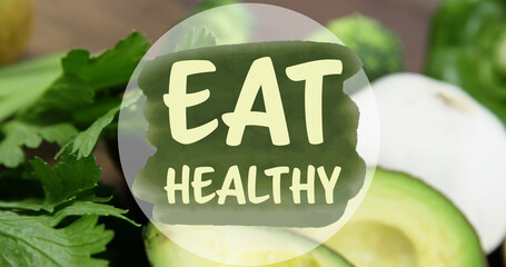Image of eat healthy text over kiwi fruit
