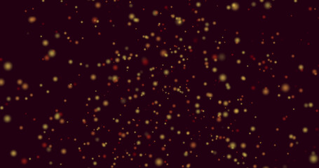 Image of yellow and red spots of light flying in hypnotic motion on black background