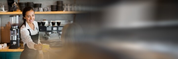 Blurred effect with copy space against caucasian waitress serving coffee at a cafe