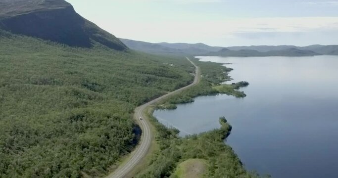 Aerial view at Kilpisjärvi, Lapland ,Finland and European route E8 that goes from Tromso, Norway to Turku, Finland in summer.
