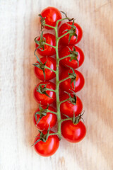 tomatoes on a wooden background