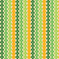 seamless pattern in green colourful shamrocks clovers four leaf clovers