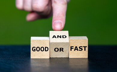 Hand turns wooden cube and changes the expression 'good or fast' to 'good and fast'.