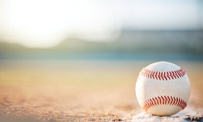 Sports, field and mockup with a baseball on the ground during a comeptitive game outdoor during summer. Fitness, exercise and a leather ball outside, ready for a match or training workout