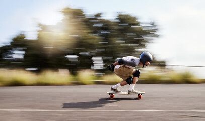 Skateboard, motion blur and mountain with man in road for speed, freedom and summer break. Sports,...