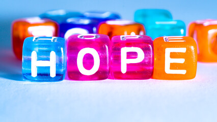 word "hope" on colorful cubes. fun concept of peace. inscription on the cubes