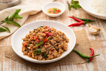Stir Fried Minced Pork with Basil leave on white plate