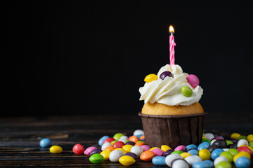 delicious vanilla cake with one birthday candle