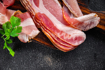 bacon strips slice smoked lard meat meal food snack on the table copy space food background rustic top view