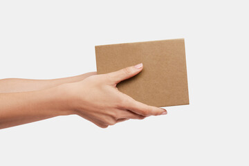 Mockup, Hands delivering a carton box, delivery service