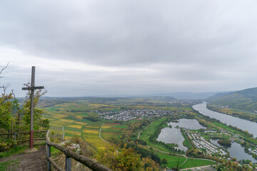 Landscape view over the river Moselle with the cross at the Kumer Kueppchen