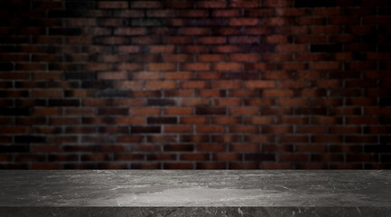 grey marble table at foreground with blurred old brown brick wall as background, brick wall texture. empty table for display montages. product displayed scene for business advertisation.