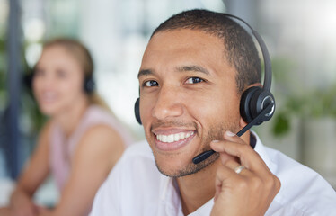 Smile, headset and portrait of a man in a call center for online support, consulting and advice....