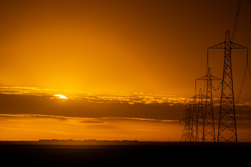 Fototapeta na wymiar Powerlines at sunset