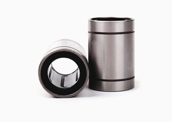 linear bearing made of metal for 3D printer. for guide bushings. on a white background. close-up
