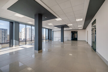 panorama view in empty modern hall with columns, doors and panoramic windows
