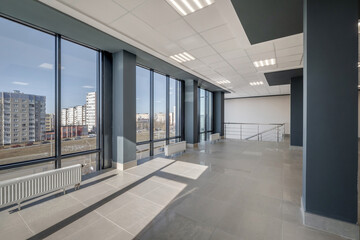 panorama view in empty modern hall with columns, doors and panoramic windows