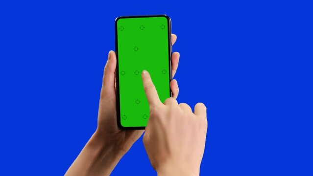 Template for cell phone with green screen and blue background. The hand points and then swipes.