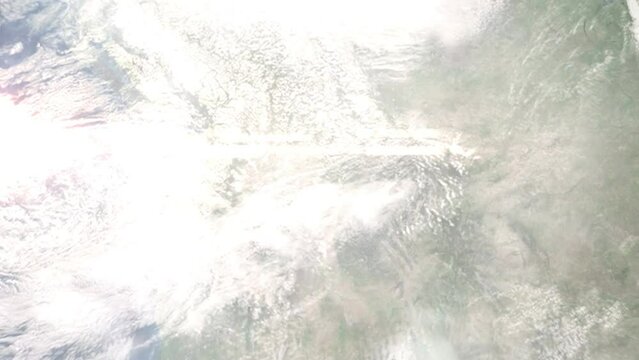 Earth zoom in from outer space to city. Zooming on Moscow, Idaho, USA. The animation continues by zoom out through clouds and atmosphere into space. Images from NASA