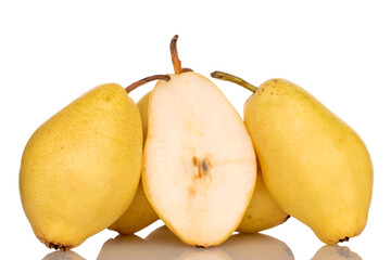 Several whole and one half organic yellow pears, close-up, isolated on white.