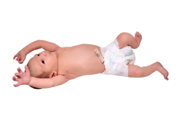 A newborn baby in diapers on a white changing table with a ruler with a Moro reflex, isolated on a white background