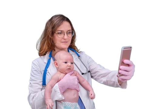 Pediatrician doctor holding phone and newborn baby, isolated on a white background. Happy nurse in uniform with a child and a mobile phone. Kid aged two months