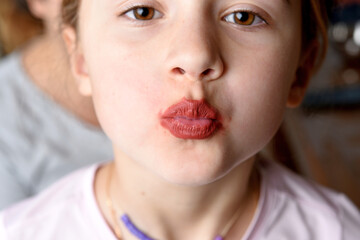 teenage girl with overflowing lipstick