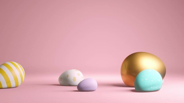 Colourful and decorated Easter eggs on a pastel pink background. 