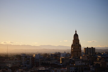 Fototapeta na wymiar Sunset in Murcia with the cathedral tower in the background