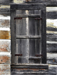Closed Shutters of Old Log House