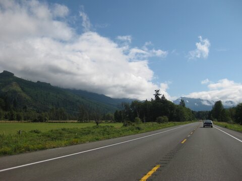 Driving Highway in Washington State, Partly Cloudy