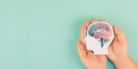 Hands holding paper head, human brain with flowers, self care and mental health concept, positive thinking, creative mind, generative AI used for brain
 - obrazy, fototapety, plakaty