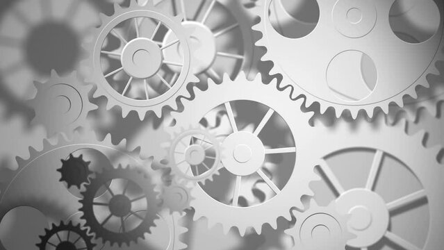 Animation of moving gears over grey background