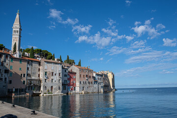 houses and bell tower in port rovinj
