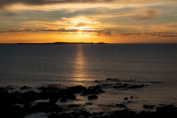 Fototapeta na wymiar Picturesque sunset over the Atlantic Ocean at Cross Abbey, Mullet Peninsula, County Mayo, Ireland