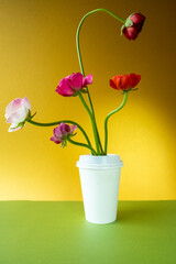 Flowers in coffee cup background