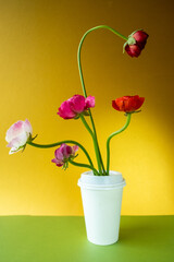Flowers in coffee cup background