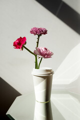 Flowers in coffee cup background