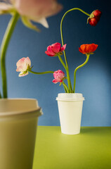 Flowers in coffee cup background