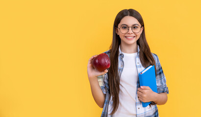 teen school girl on background with copy space. photo of teen school girl with book.