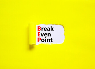BEP break even point symbol. Concept words BEP break even point on white paper on a beautiful yellow background. Business and BEP break even point concept. Copy space.