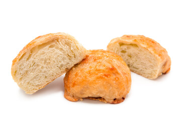 Freshly baked cheese buns isolated on white background. Whole bun and cut into halves.	