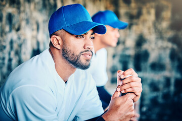 Baseball player, stadium dugout and sport training focus of a athlete looking at game. Summer sports, teamwork and workout of a person with softball group at professional event for outdoor exercise