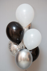 silver and black balloons